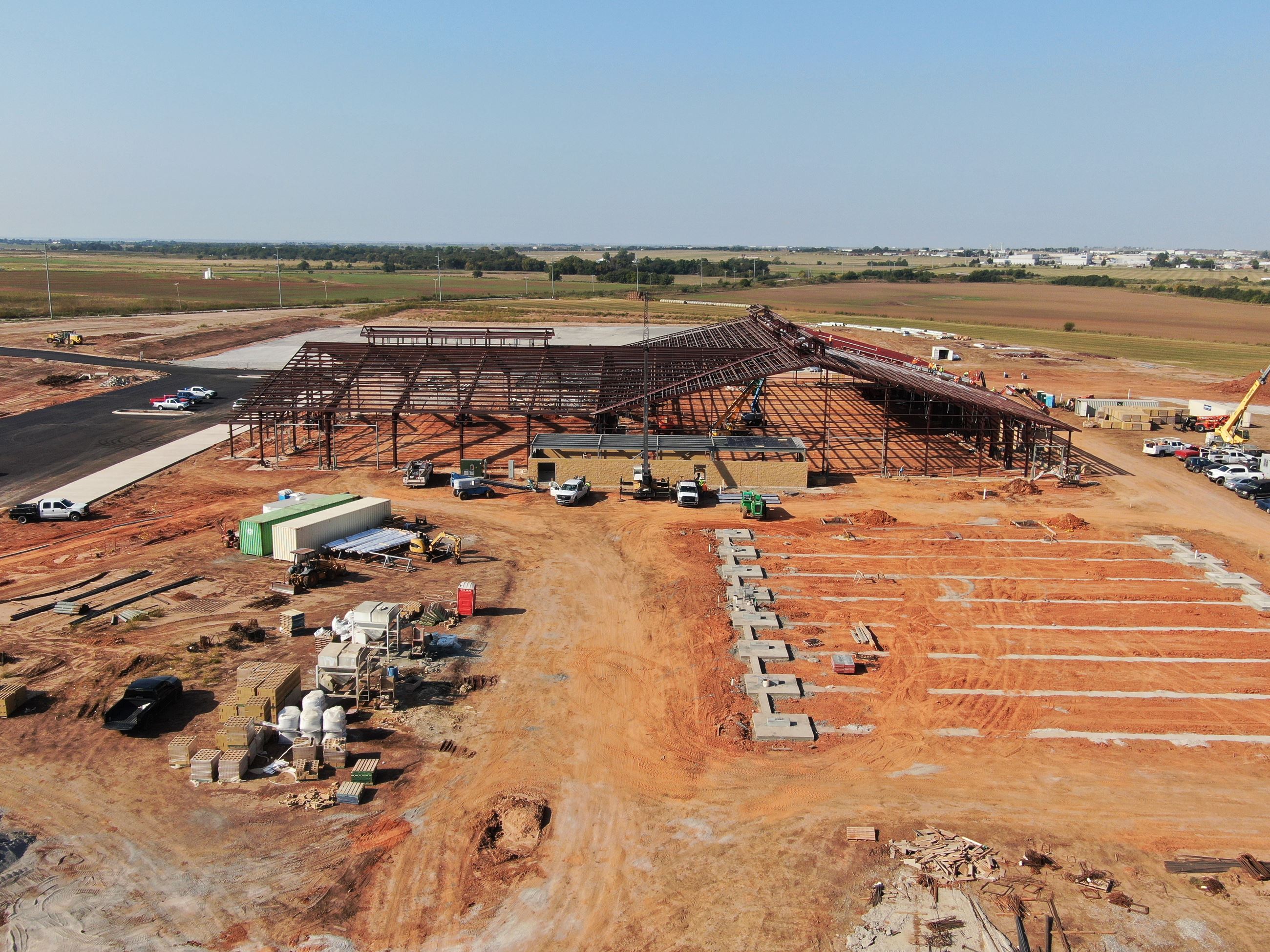Drone shot looking South West over construction of Barn, Expo Hall, and Arena